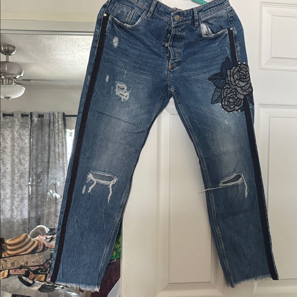 Distressed Blue Jeans with Floral Patch